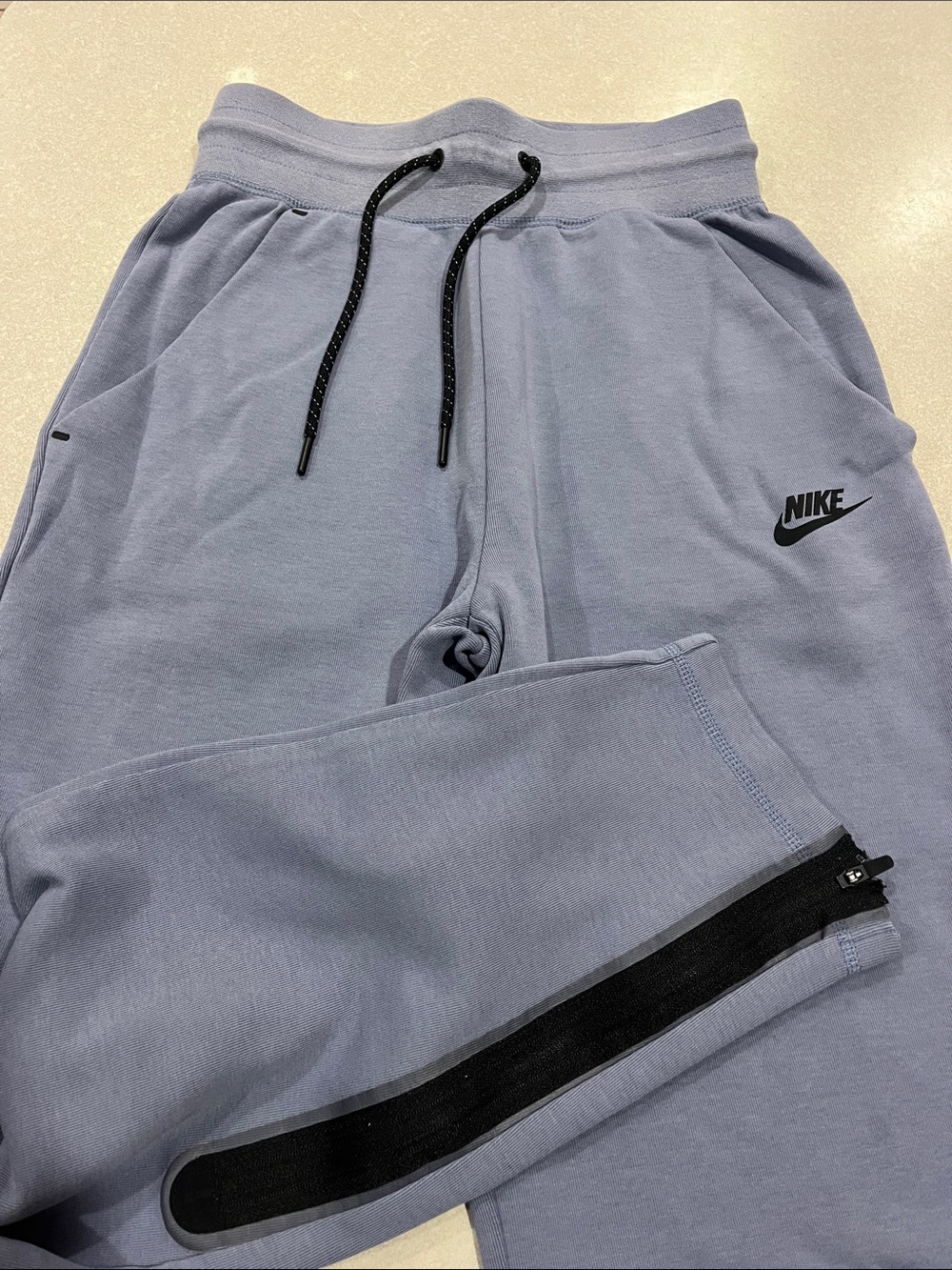 Nike Tech Light Blue Joggers with Black Accents